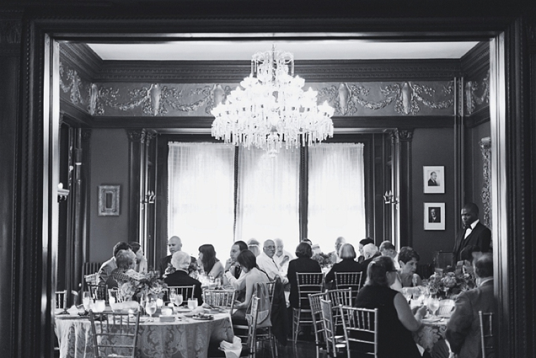 Guests sitting at tables during the wedding reception.