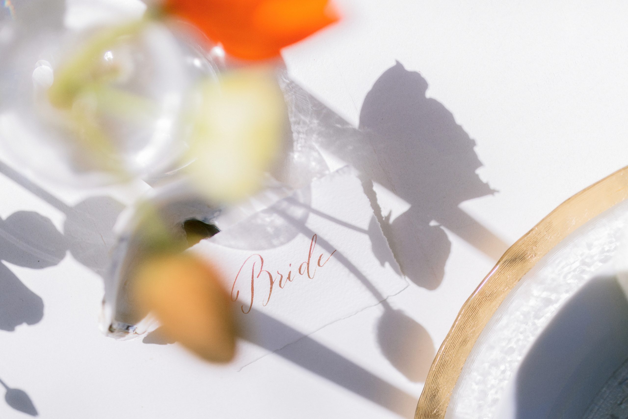 A place card that reads bride.