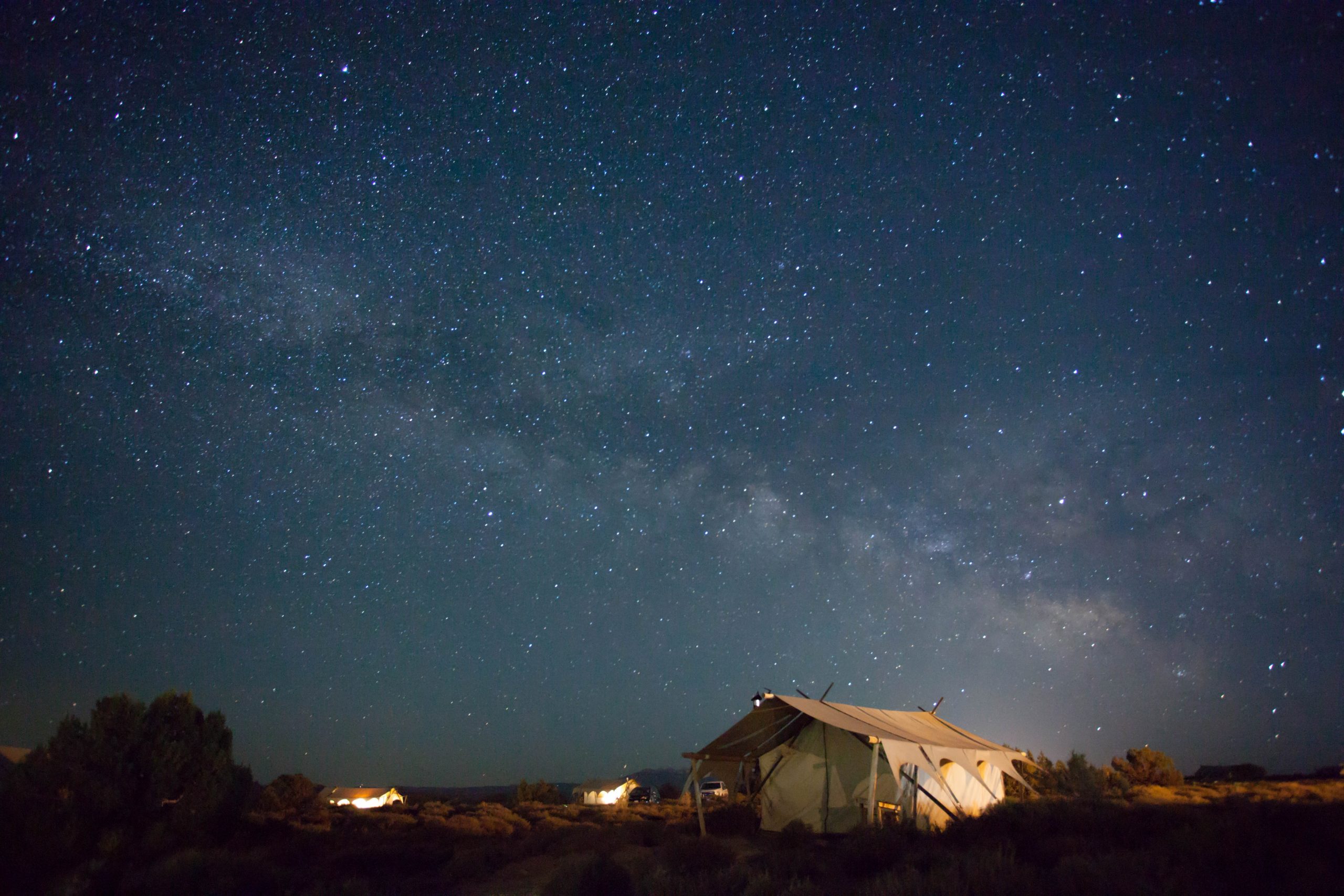 A large tent under a starlit sky