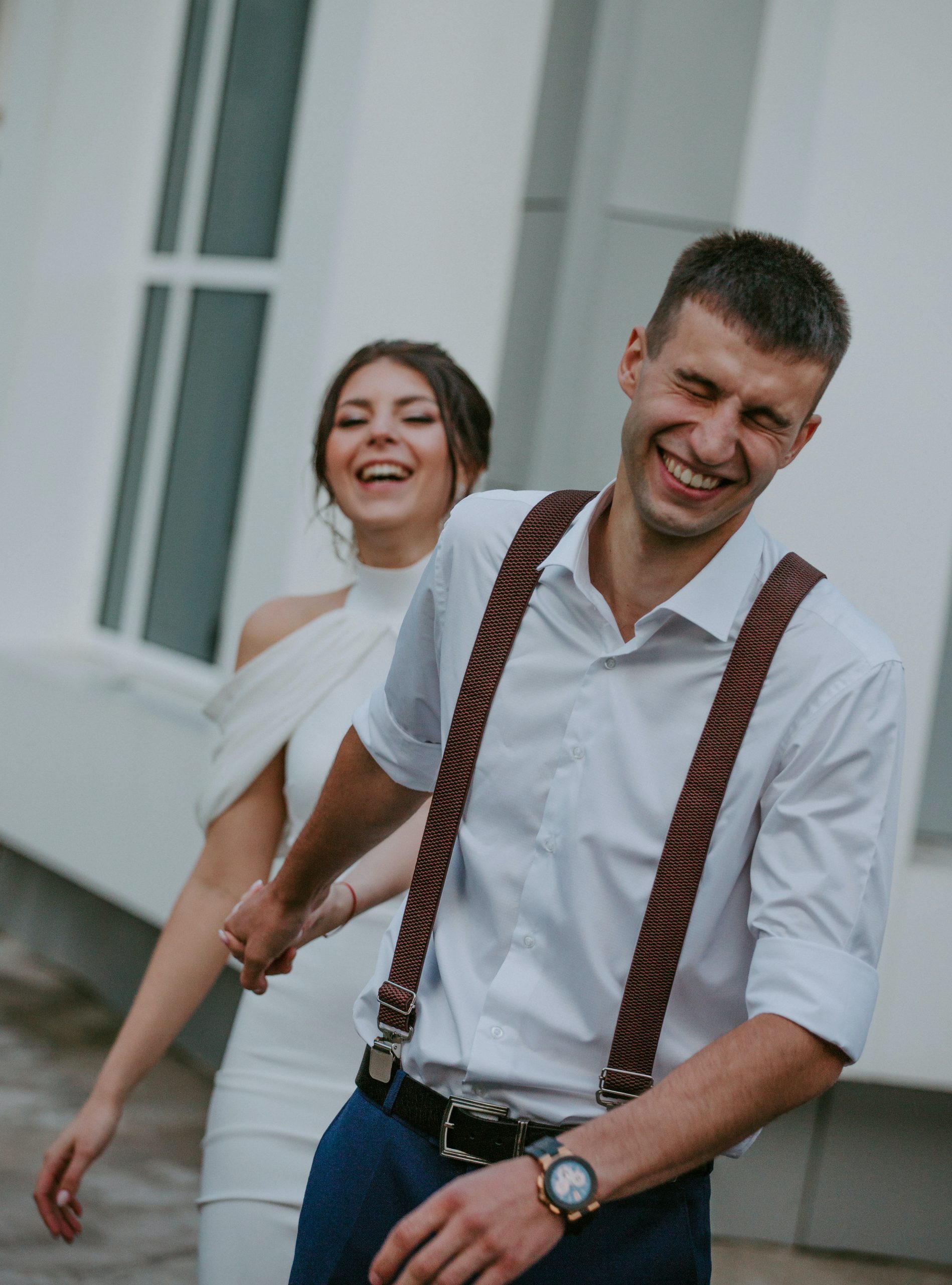 a couple eloping and laughing