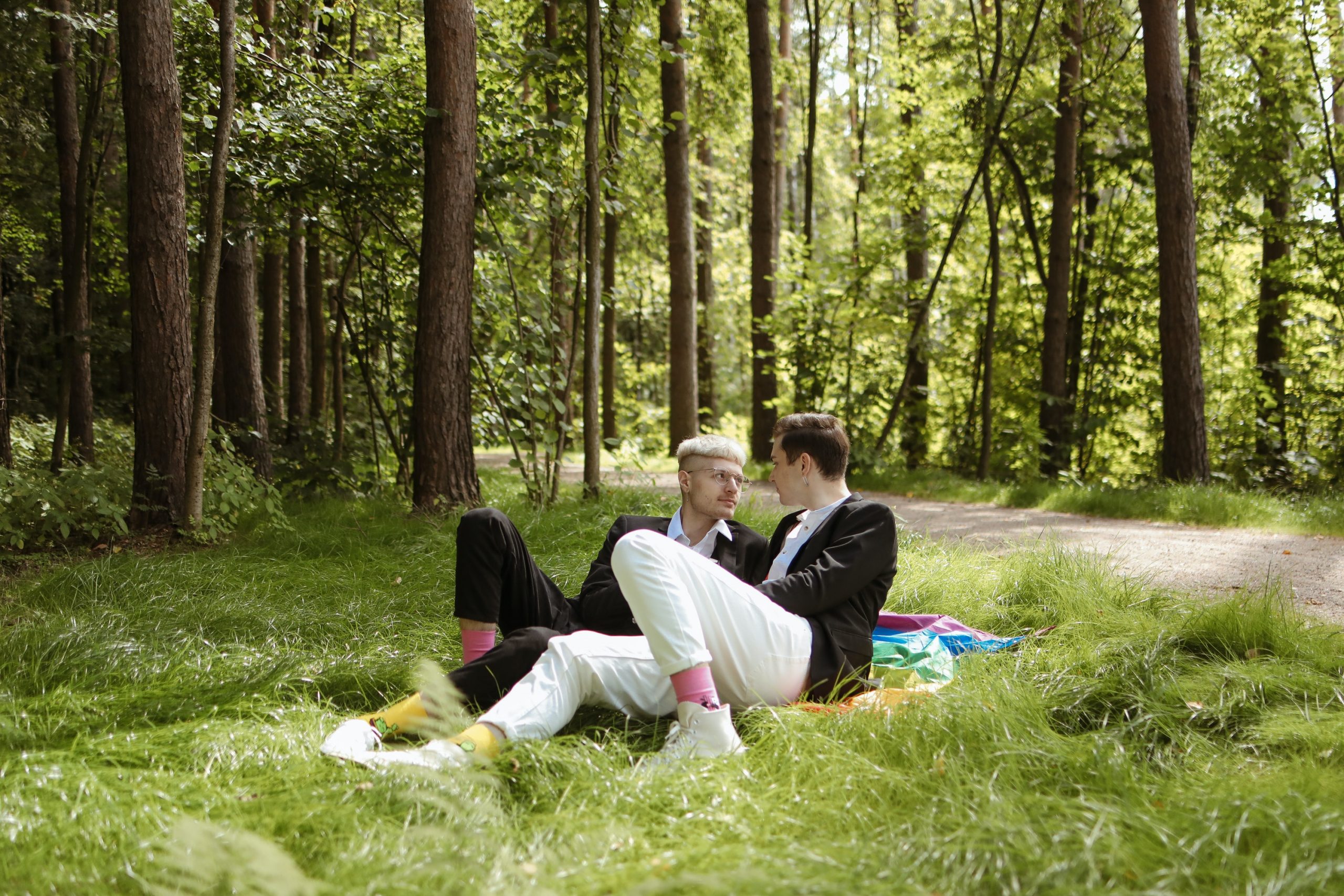 a couple eloping on a picnic blanket